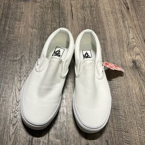 Vans Classic slip ons.